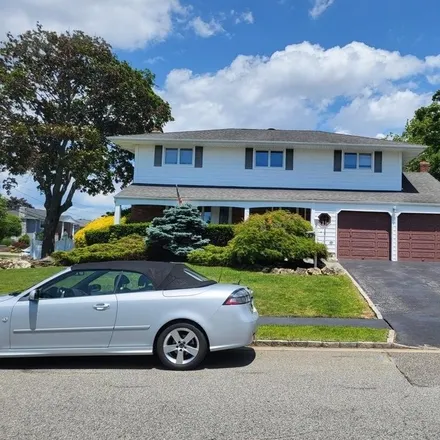 Buy this 4 bed house on 27 Tanwood Drive in Massapequa, NY 11758