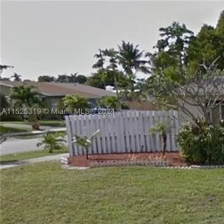 Buy this 3 bed house on 287 Northeast 58th Street in Broward County, FL 33334