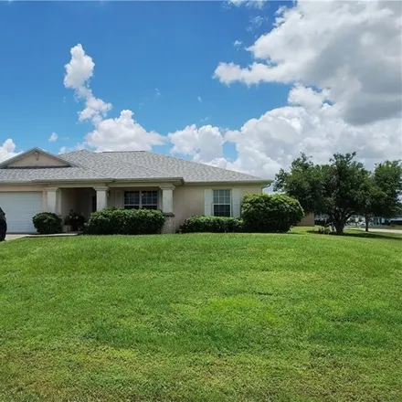 Buy this 3 bed house on 526 NW 1st Ln in Cape Coral, Florida