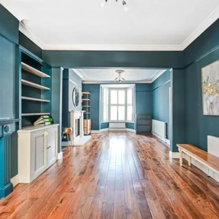 Rent this 4 bed house on 5 Parkwood Road in London, SW19 7AQ