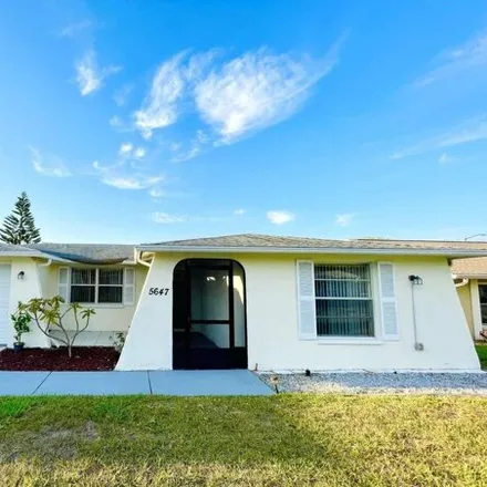 Buy this 3 bed house on 5667 Mirada Drive in Elfers, FL 34690