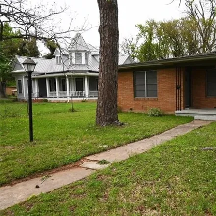 Rent this 2 bed house on 707 North Main Street in Elgin, TX 78621