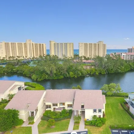 Rent this 2 bed condo on 1398 Clubhouse Circle in Jupiter, FL 33477