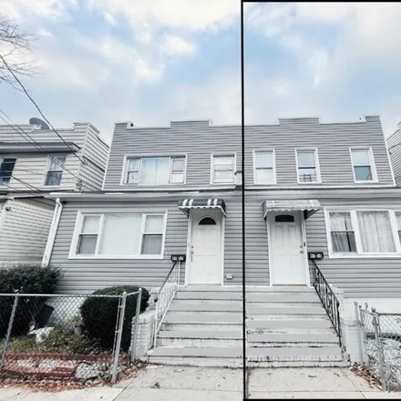 Buy this 7 bed house on 93-10 75th Street in New York, NY 11421