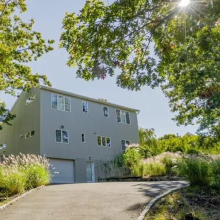 Rent this 4 bed house on 38 Red Creek Circle in Southampton, Hampton Bays