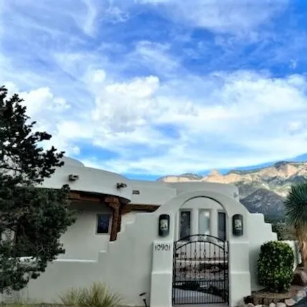 Buy this 5 bed house on 10901 Elena Drive Northeast in Albuquerque, NM 87122