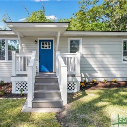 Buy this 3 bed house on 1586 Dell Street in Savannah, GA 31415