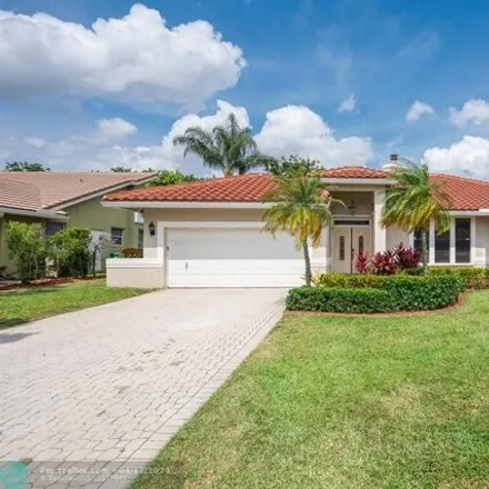 Buy this 4 bed house on Forest Glen Middle School in Turtle Run Boulevard, Coral Springs