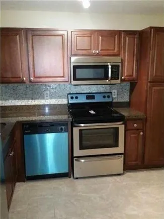 Buy this 2 bed condo on Northwest 49th Terrace in Coconut Creek, FL 33066