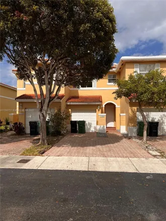 Rent this 2 bed townhouse on 11029 Northwest 43rd Lane in Doral, FL 33178