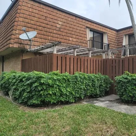 Buy this 2 bed townhouse on 2468 24th Lane in Greenacres, FL 33463