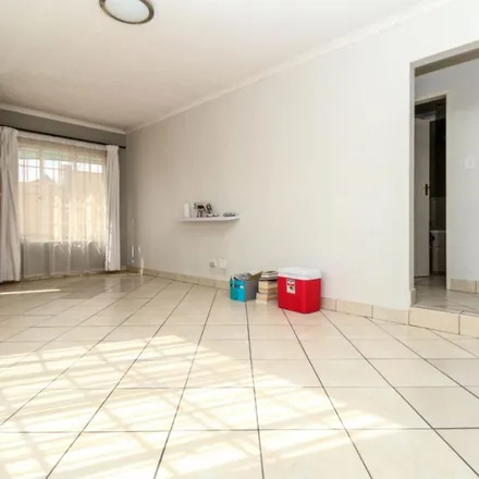 Rent this 2 bed townhouse on 12th Street in Greymont, Johannesburg