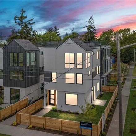 Buy this 4 bed house on 3201 61st Avenue Southwest in Seattle, WA 98116