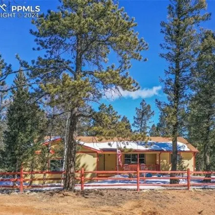 Buy this 4 bed house on 823 Spring Valley Drive in Teller County, CO 80814