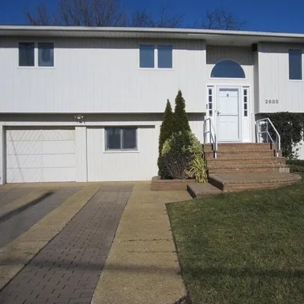 Rent this 4 bed house on 2685 John Street in Bellmore, NY 11710