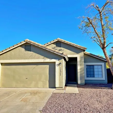 Rent this 3 bed house on 12946 West Sharon Drive in El Mirage, AZ 85335