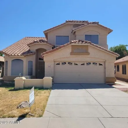 Rent this 4 bed house on 8929 West Davis Road in Peoria, AZ 85382