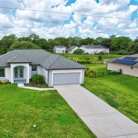 Buy this 3 bed house on 2205 Tena Avenue North in Lehigh Acres, FL 33971