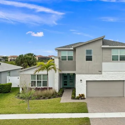 Buy this 4 bed house on 11461 Sw Lyra Dr in Port Saint Lucie, Florida