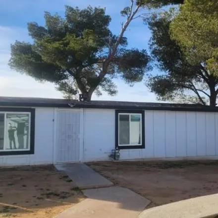 Rent this 3 bed house on 9836 North Loop Boulevard in California City, CA 93505