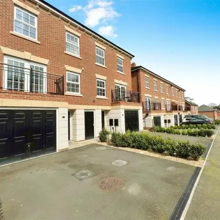 Buy this 4 bed townhouse on Radcliffe Court in Newton Hill, WF1 3DQ