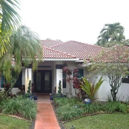 Buy this 5 bed house on 5044 Northwest 87th Terrace in Pine Ridge, Coral Springs