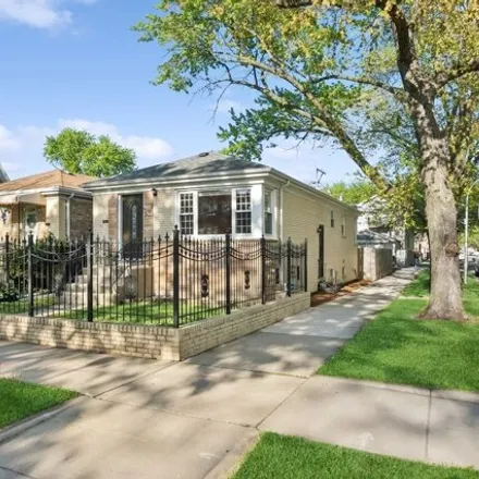 Buy this 3 bed house on 3101 North Spaulding Avenue in Chicago, IL 60618