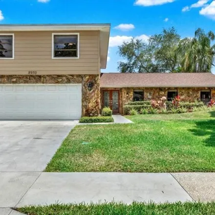 Buy this 4 bed house on 8890 Baywood Park Drive in Seminole, FL 33777