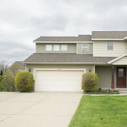 Buy this 4 bed house on 6493 Dew Pointe Avenue Southeast in Gaines Charter Township, MI 49316