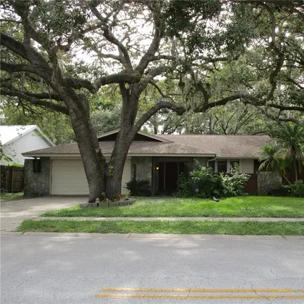 Buy this 4 bed house on 943 Spanish Oaks Boulevard in Palm Harbor, FL 34683