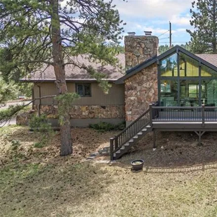 Buy this 5 bed house on 29933 Gigi Road in Evergreen, CO 80439