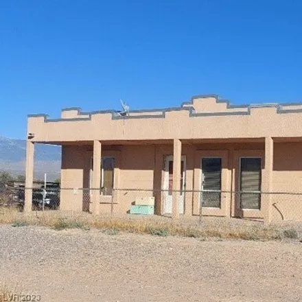Buy this 3 bed house on 3123 Quail Run Road in Pahrump, NV 89060