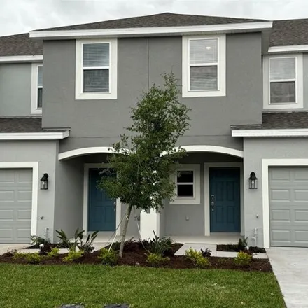 Rent this 3 bed townhouse on Paravane Way in Pasco County, FL