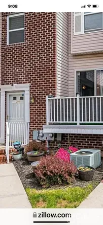 Rent this 2 bed townhouse on 421 Great Beds Court in Perth Amboy, NJ 08861