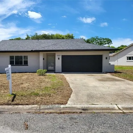 Buy this 3 bed house on 12333 Larkinwood Lane in Bayonet Point, FL 34667