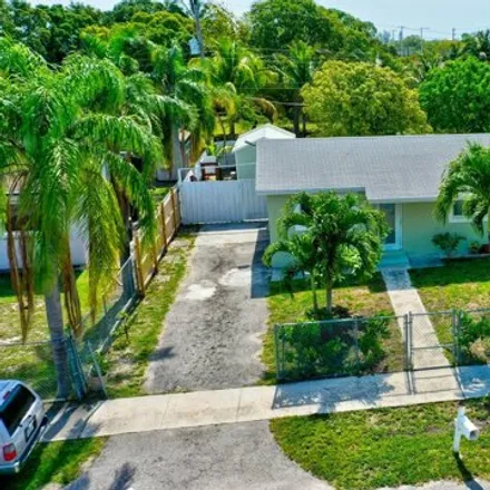 Buy this 3 bed house on 945 Southwest 2nd Avenue in Delray Beach, FL 33444