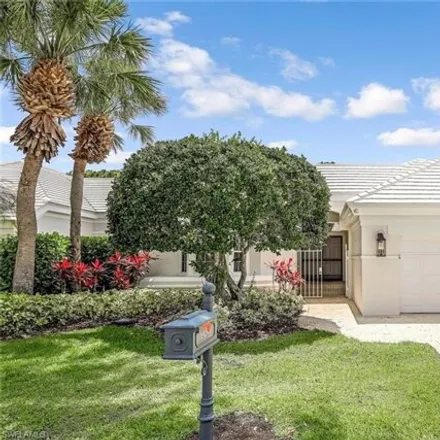 Buy this 3 bed house on Audubon Country Club in 625 Audubon Boulevard, Naples