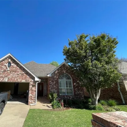 Rent this 3 bed house on 4701 Village Oak Drive in Arlington, TX 76017