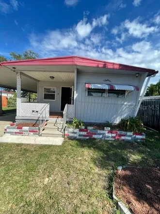 Buy this 2 bed house on 1930 Hoyle Drive in Holiday, FL 34691