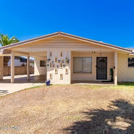 Buy this 4 bed house on 6272 West Wolf Street in Phoenix, AZ 85033