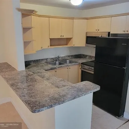 Rent this 2 bed condo on 3028 Northwest 118th Drive in Coral Springs, FL 33065