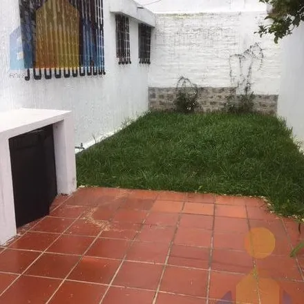 Rent this 4 bed house on Chilli Wings in Avenida General Eloy Alfaro, 170504