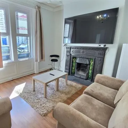 Rent this 6 bed townhouse on Carrs Barbers Club in 1 Clayton Park Square, Newcastle upon Tyne