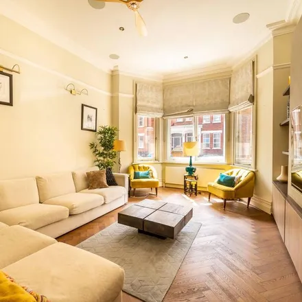 Rent this 3 bed apartment on 56 Comeragh Road in London, W14 9HS