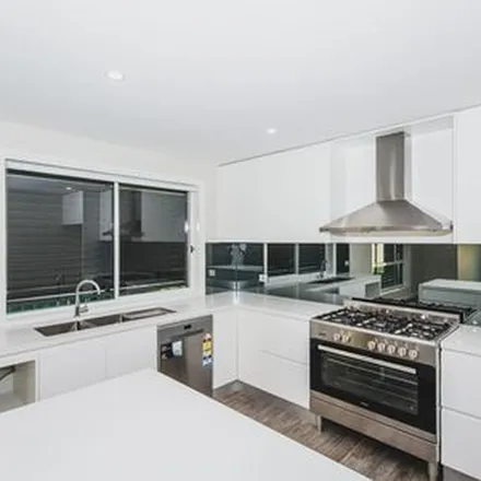 Rent this 4 bed apartment on Tungarra Road in Girraween NSW 2145, Australia