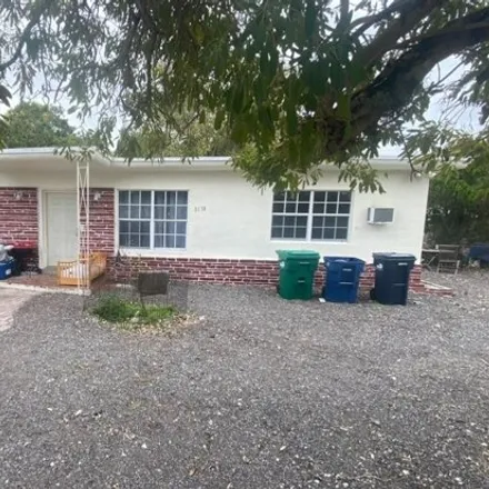Buy this 4 bed house on 3170 Northwest 100th Street in Miami-Dade County, FL 33147