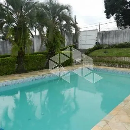 Buy this 4 bed house on Escola Rosa Torres de Miranda in Rua Melvin Jones 389, Jardim Atlântico