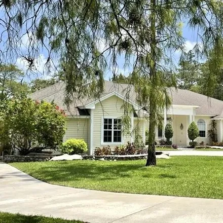 Buy this 5 bed house on 11751 Piping Plover Road in Palm Beach County, FL 33449