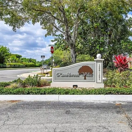 Buy this 3 bed house on 1724 East Riverwood Lane in Coral Springs, FL 33071