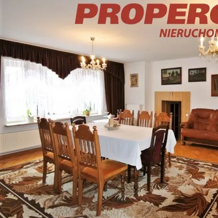 Buy this studio house on Józefa Piłsudskiego 2 in 05-822 Milanówek, Poland